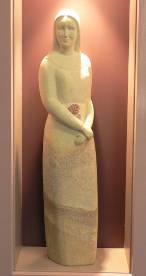 Statue representing faith and reflection within the school’s Catholic tradition